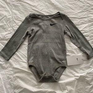 Nike Gray Long Sleeve Baby Onesie